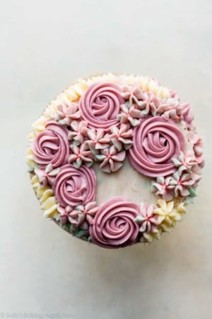 Buttercream roses and hydrangeas on top of 6 inch cake