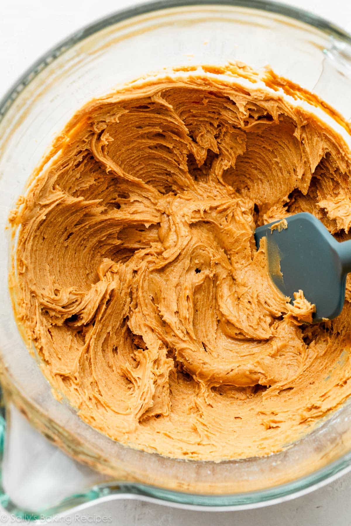 peanut butter dough mixture in glass bowl.