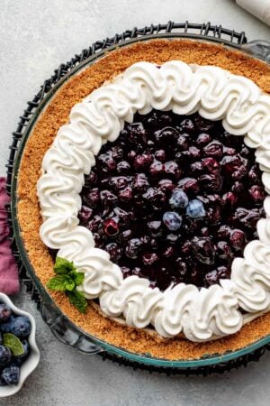 blueberry cream cheese pie with whipped cream.