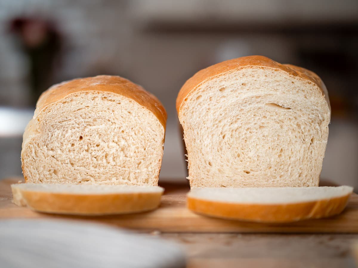 two loafs of bread shown for comparison of bread made from dough that was not kneaded and dough that was kneaded.