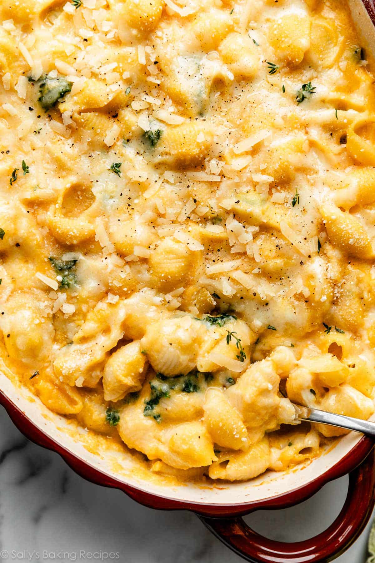 close up overhead photo of butternut squash mac and cheese with kale.