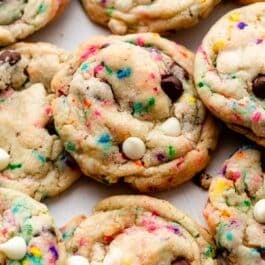 sprinkle chocolate chip cookies with white chocolate chips.