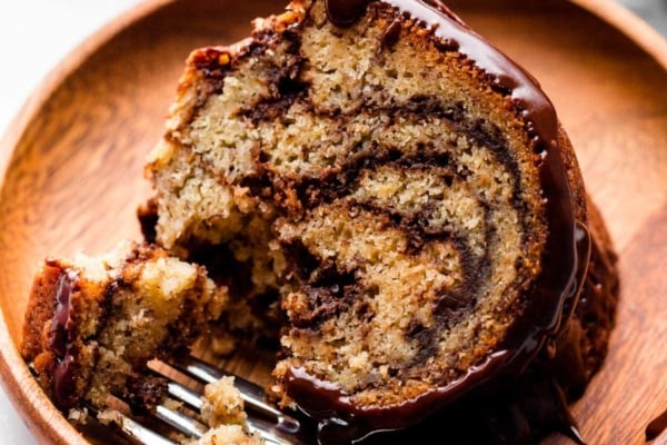 slice of chocolate marble banana bundt cake on plate