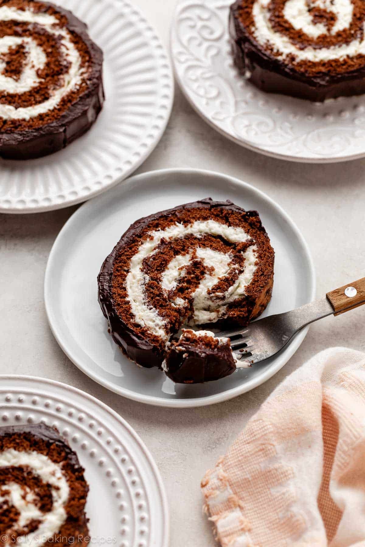 plated slices of chocolate swiss roll cake.