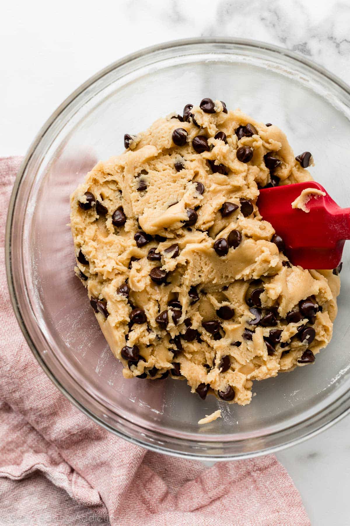 chocolate chip cookie dough in glass bowl