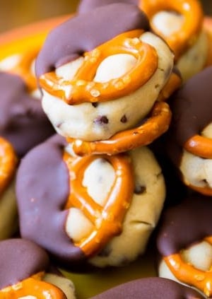 cookie dough pretzel bites on a yellow plate