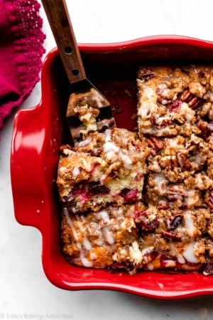 cranberry pecan crumb cake in red baking dish