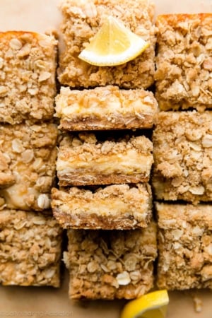 creamy lemon oat crumble bars with lemon slices