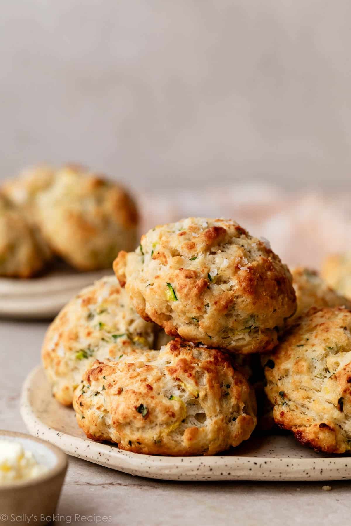 zucchini drop biscuits on speckled plate.