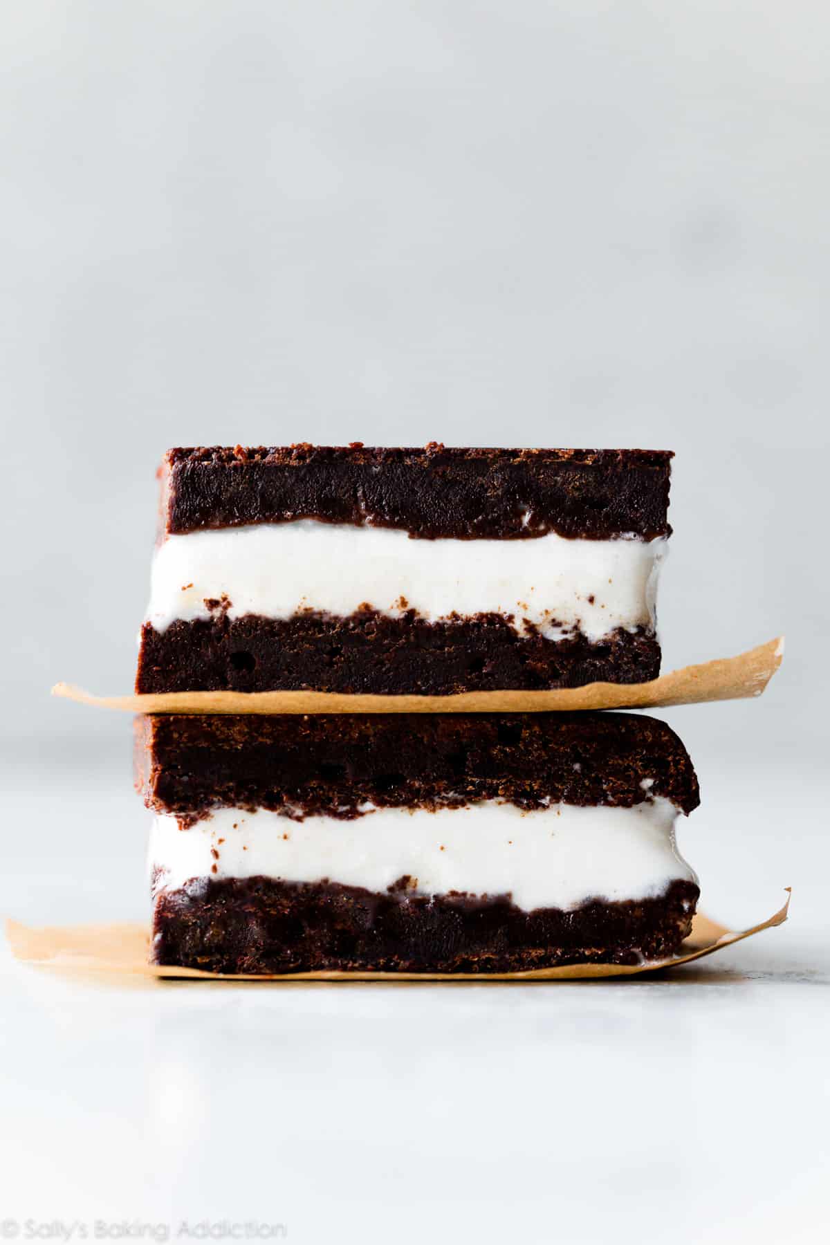 two homemade brownie ice cream sandwiches