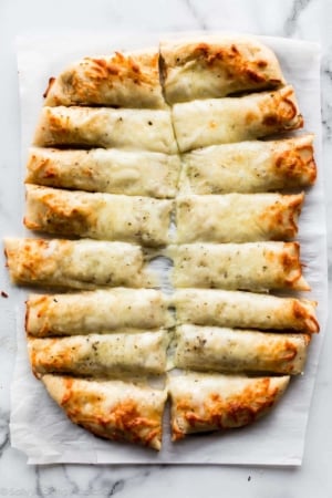 Homemade cheesy breadsticks with garlic