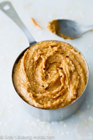 honey roasted peanut butter in a measuring cup