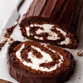 homemade swiss roll with chocolate ganache and whipped filling.