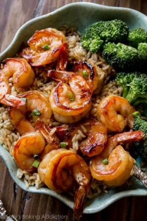 Honey garlic shrimp in a bowl with rice and broccoli