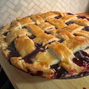 picture of berry pie with lattice crust.