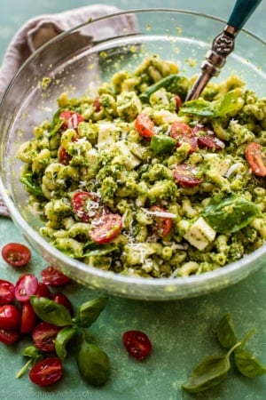 pesto pasta salad in a glass bowl