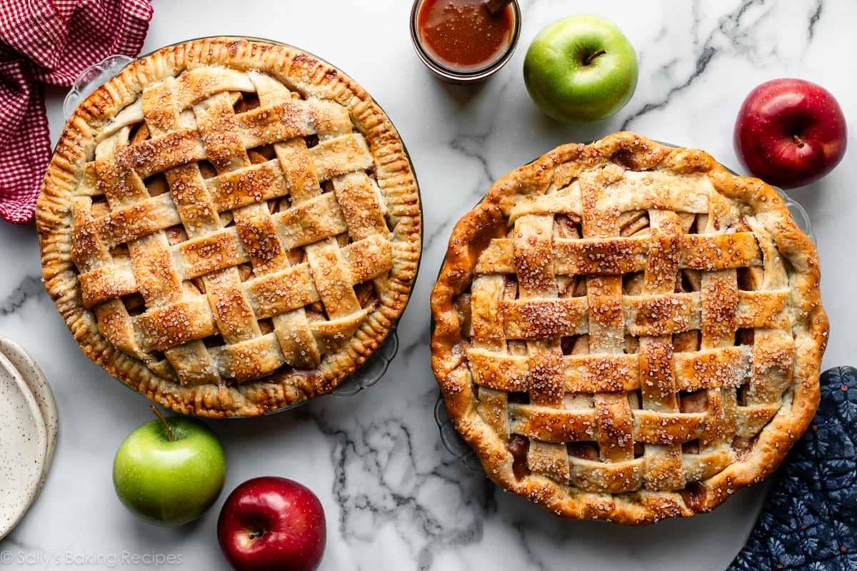 two apple pies shown with lattice pie crust tops and one with a crimped pie crust edge and another with a fluted pie crust edge.