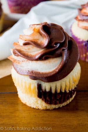 marble cupcakes topped with chocolate vanilla swirl frosting