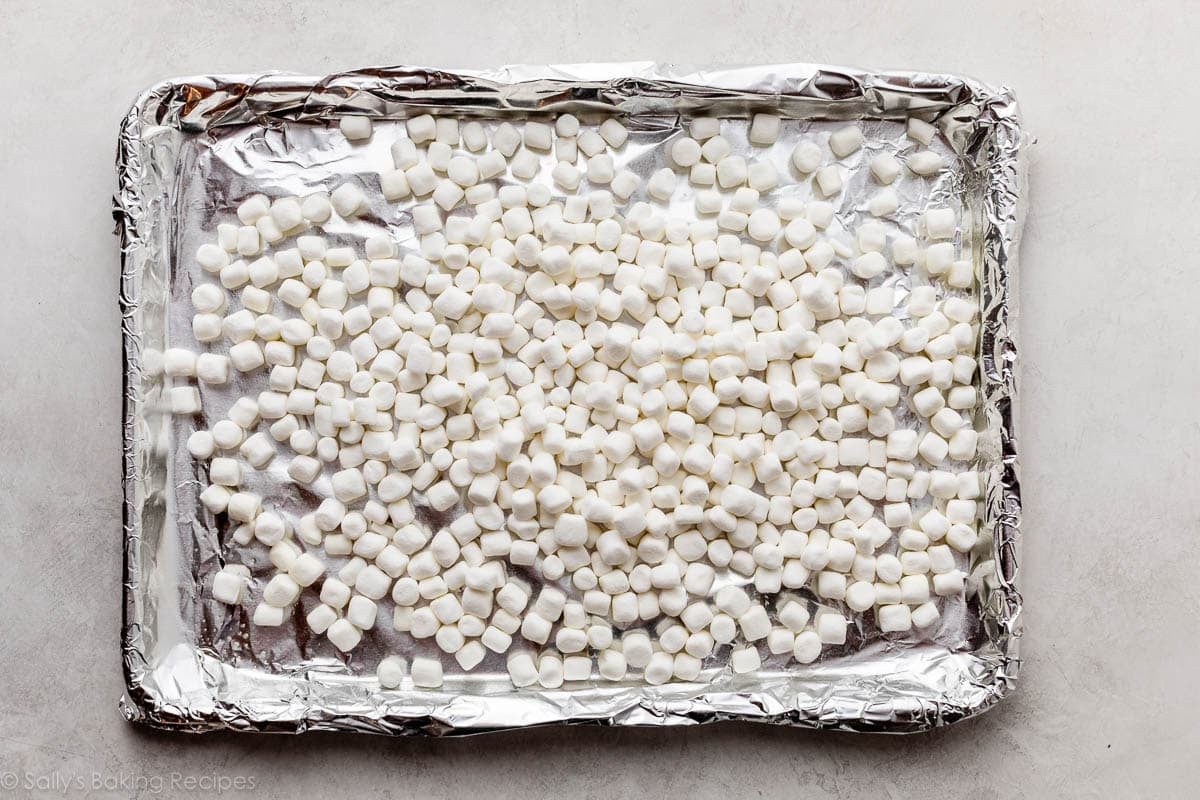 marshmallows on foil-lined baking sheet.