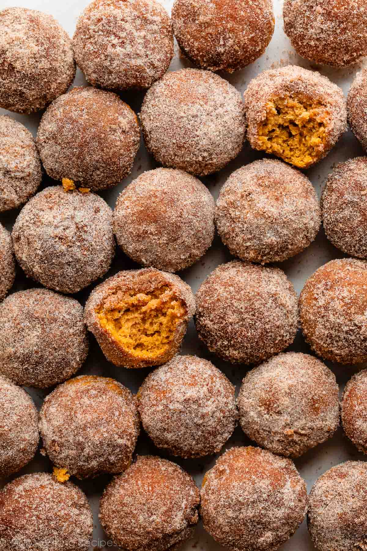 mini cinnamon sugar pumpkin muffins overhead photo.