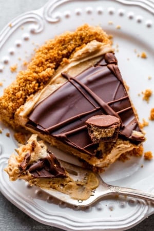 slice of peanut butter cup tart on a white plate