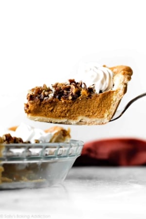 slice of pecan praline pumpkin pie on a pie server