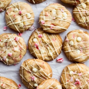 overhead image of peppermint white chocolate cookies drizzled with white chocolate