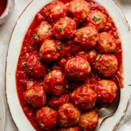 meatballs in marinara sauce on platter.