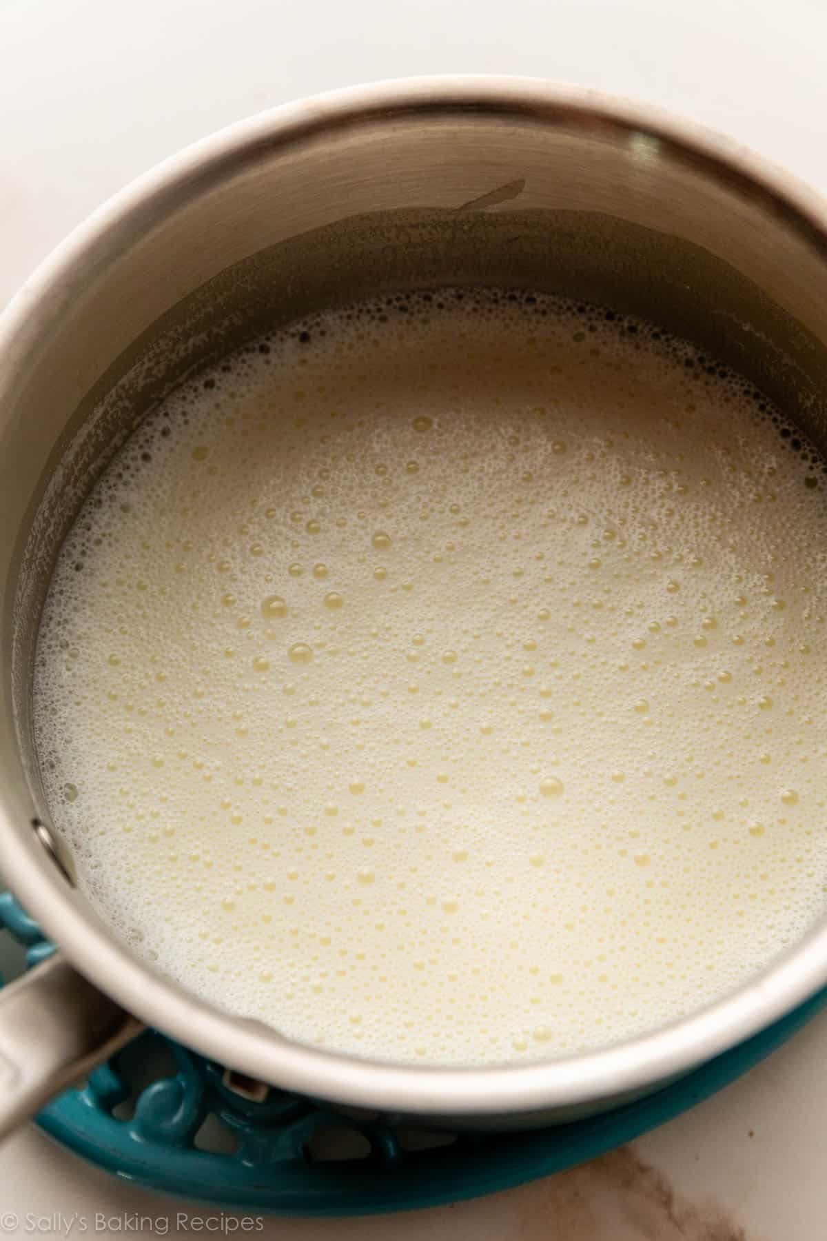 heated milk and sugar mixture in pot.