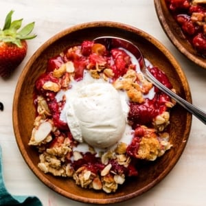 strawberry vanilla crisp with ice cream on top