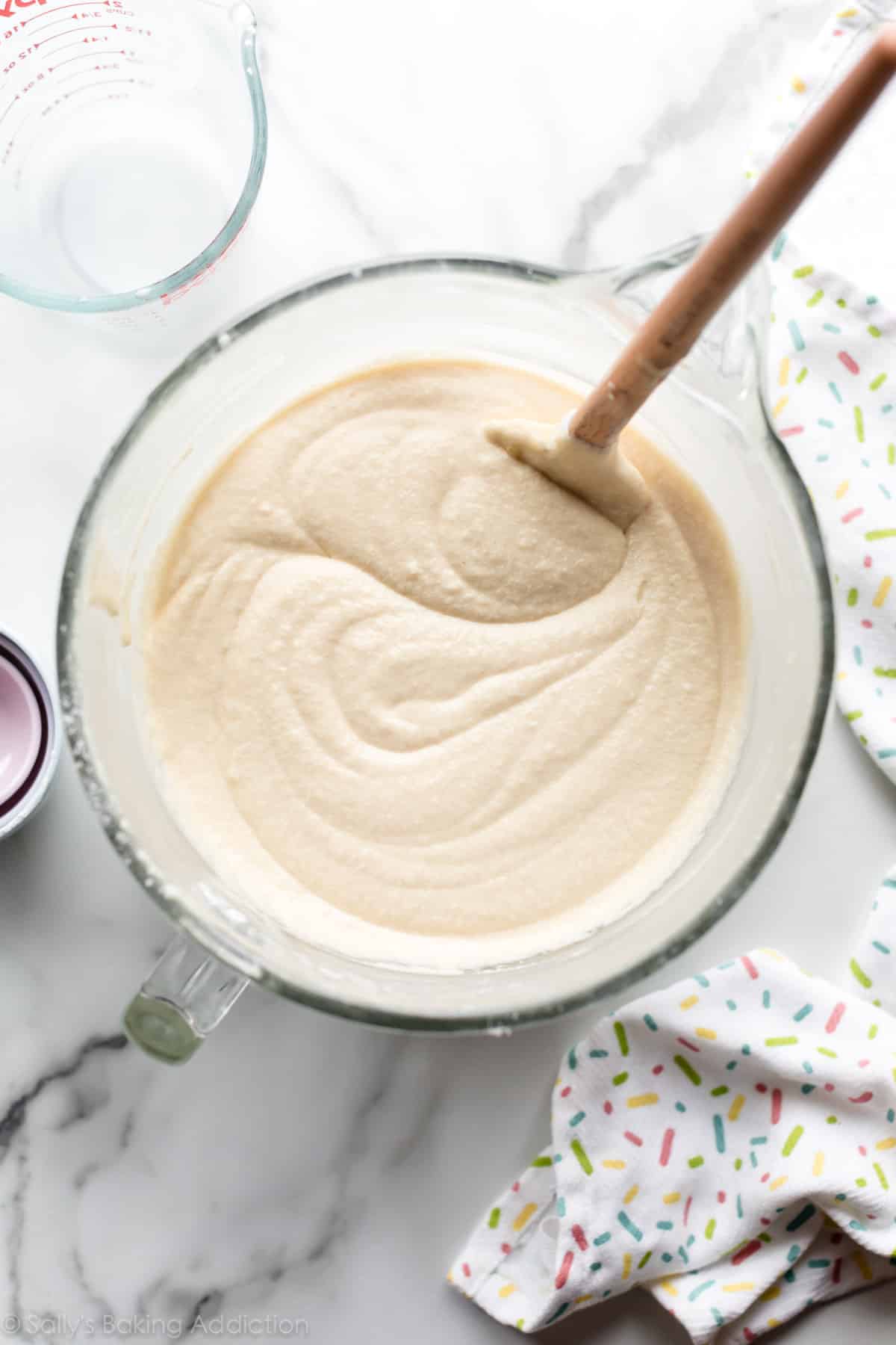 Vanilla cake batter in a glass bowl